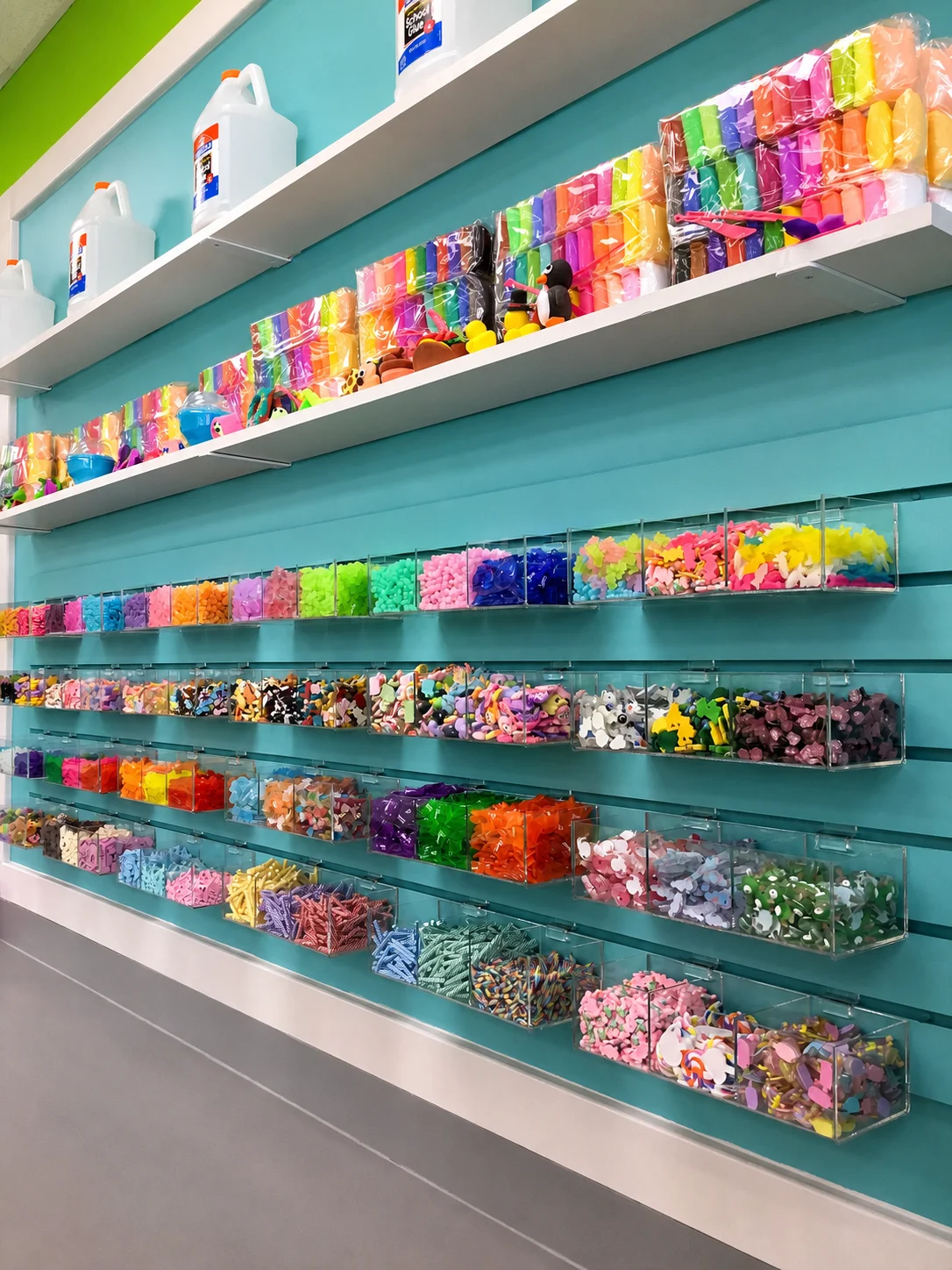 Colorful slime charms and clay-topper options displayed at Funtastik Labs